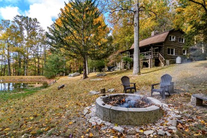 Secluded Log Cabin Rental with Private Hot Tub near Asheville, North Carolina - Hendersonville, North Carolina - glamping.directory