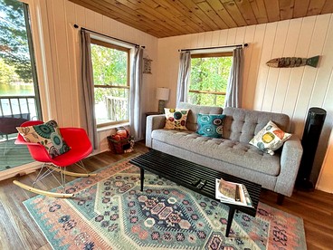 Charming Lakefront Cabin with Hot Tub and Beach Access near Traverse City, Michigan - Traverse City, Michigan - glamping.directory