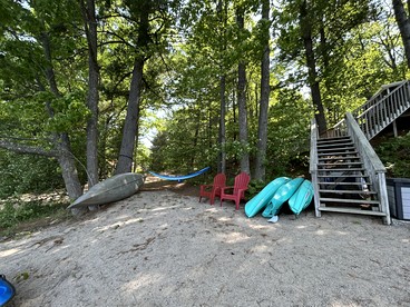 Charming Lakefront Cabin with Hot Tub and Beach Access near Traverse City, Michigan - Traverse City, Michigan - glamping.directory