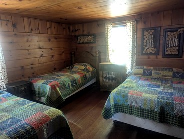 Simple Cabin Rental with Screened-In Porch on Moose Lake near Eau Claire - Hayward, Wisconsin - glamping.directory