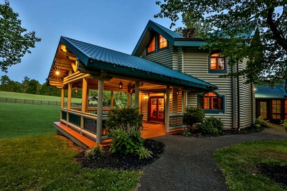 Lakefront Log Elegance: True Cabin with Hot Tub and Sauna Amidst Mountain Views - glamping.directory