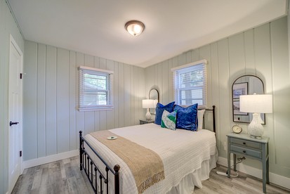 Lakeside Cabin Rental with Beach Access and Fire-Pit for Relaxing Getaways to Lake Michigan - Muskegon, Michigan - glamping.directory