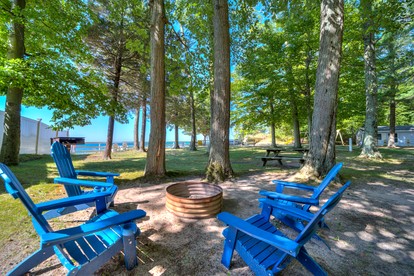 Lakeside Cabin Rental with Beach Access and Fire-Pit for Relaxing Getaways to Lake Michigan - Muskegon, Michigan - glamping.directory