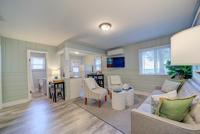 Lakeside Cabin Rental with Beach Access and Fire-Pit for Relaxing Getaways to Lake Michigan - Muskegon, Michigan - glamping.directory