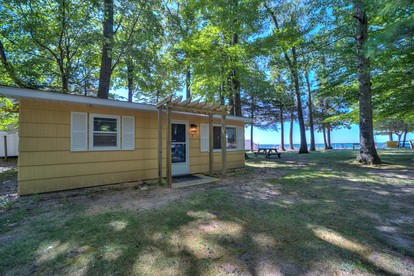 Lakeside Cabin Rental with Beach Access and Fire-Pit for Relaxing Getaways to Lake Michigan - glamping.directory