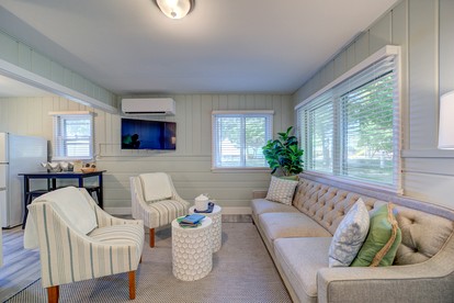 Lakeside Cabin Rental with Beach Access and Fire-Pit for Relaxing Getaways to Lake Michigan - Muskegon, Michigan - glamping.directory