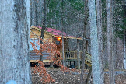 Enchanting Cabin Rental in the Woods with Shared Hot Tub near Arab, Alabama - Union Grove, Alabama - glamping.directory