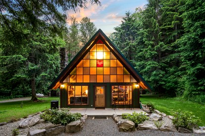 Secluded Forest Retreat with Hot Tub and Stone Fireplace in Ashford, Washington - glamping.directory