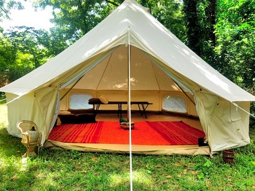 Riverfront Tent Rental for Luxury Camping near Eureka Springs - glamping.directory