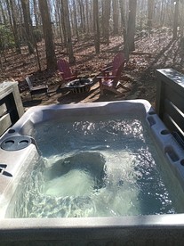 Luxurious Tiny Cabin with Hot-Tub and Fire Pit in Tennessee - Monteagle, Tennessee - glamping.directory