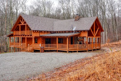Large Cabin Rental with Games Room and Hot Tub in Logan, Ohio - glamping.directory