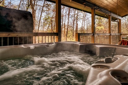 Romantic Luxury Cabin • Hot Tub & Sauna near Dollywood, Sevierville TN - Sevierville, Tennessee - glamping.directory