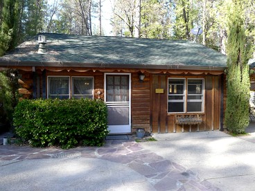 Cozy Log Cabin Rental with a Hot Tub near Nevada City, California - glamping.directory