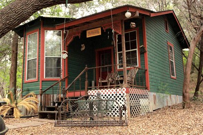 Rustic Victorian-Style Cottage Rental with Clawfoot Bathtub on Hamilton Creek, Texas - glamping.directory