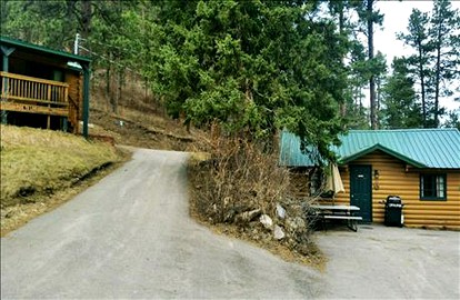 Two-Bedroom Log Cabin Rental near Mount Rushmore, South Dakota - Lead, South Dakota - glamping.directory