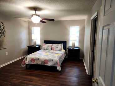 Quaint Cottage with Covered Dock on the Pond and Walking Trails in Georgia - Midway, Georgia - glamping.directory