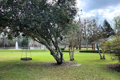 Quaint Cottage with Covered Dock on the Pond and Walking Trails in Georgia - Midway, Georgia - glamping.directory