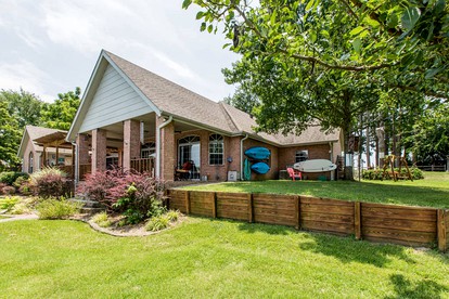 Spacious Cottage Rental on the Shores of Cedar Creek Lake in Mabank, Texas - glamping.directory