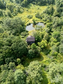 Secluded Creative Hideaway with Pond, Porch & Forest Views in Andes, New York - Andes, New York - glamping.directory