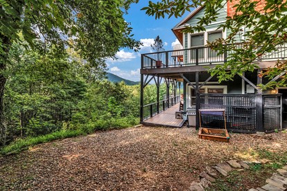 Cozy Mountain Retreat with Hot Tub and Fire Pit near Black Mountain, North Carolina - glamping.directory