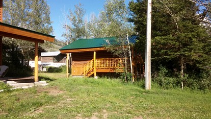 Rustic Cabin Rental with Views of Henry's Lake in Island Park, Idaho - Island Park, Idaho - glamping.directory