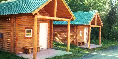 Rustic Cabin Rental with Views of Henry's Lake in Island Park, Idaho - Island Park, Idaho - glamping.directory