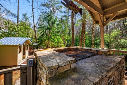 Secluded Riverfront Cabin with Hot Tub, Sauna & Private Trails near Cashiers, North Carolina - Cashiers, North Carolina - glamping.directory