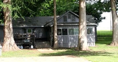 Rustic Waterfront Cottage Rental on the Guadalupe River in Texas - glamping.directory