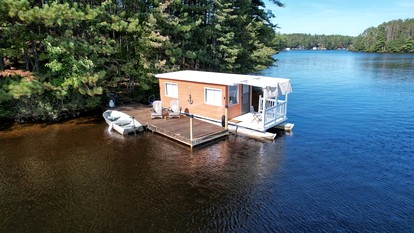 Unique Floating Home on Private Island for a Memorable Romantic Escape on Brantingham Lake, New York - glamping.directory