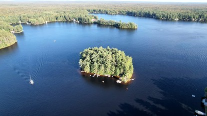 Unique Floating Home on Private Island for a Memorable Romantic Escape on Brantingham Lake, New York - Greig, New York - glamping.directory