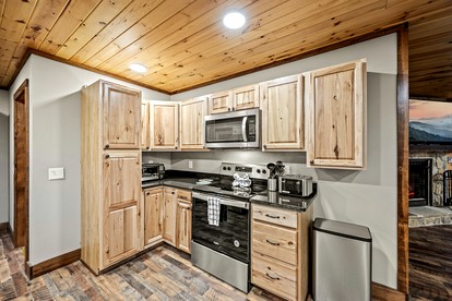 Luxury Pet-Friendly Cabin with Game Room, Hot Tub, and Fenced Yard in Arts and Crafts Community, Gatlinburg - Gatlinburg, Tennessee - glamping.directory