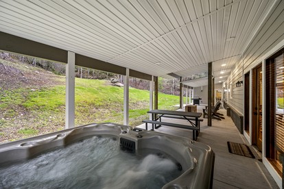 Luxury Pet-Friendly Cabin with Game Room, Hot Tub, and Fenced Yard in Arts and Crafts Community, Gatlinburg - Gatlinburg, Tennessee - glamping.directory