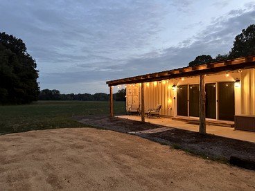 Charming Container Home with Hot Tub near Sardis Lake, Perfect for a Romantic Glamping Getaway - glamping.directory