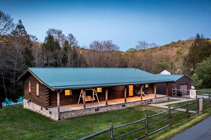 Glamping Retreat near Summersville Lake: Luxurious Cabin with a Hot Tub in Mt Nebo, WV - glamping.directory