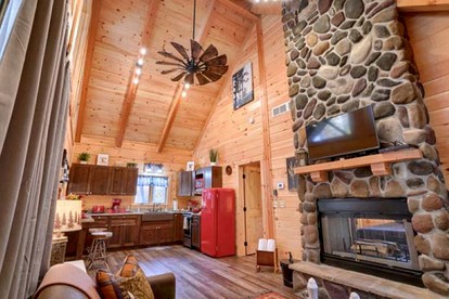 Romantic Getaways to this Rustic Cabin Rental with Stone Fireplace in Logan, Ohio - Logan, Ohio - glamping.directory