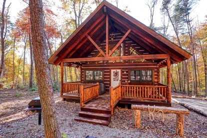 Romantic Getaways to this Rustic Cabin Rental with Stone Fireplace in Logan, Ohio - glamping.directory