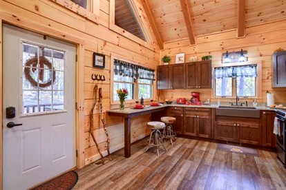 Romantic Getaways to this Rustic Cabin Rental with Stone Fireplace in Logan, Ohio - Logan, Ohio - glamping.directory