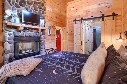Romantic Getaways to this Rustic Cabin Rental with Stone Fireplace in Logan, Ohio - Logan, Ohio - glamping.directory