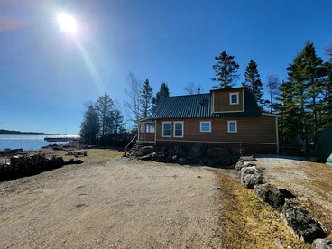 Lakefront Secluded Cabin with Fireplace in Cedarville, Michigan - glamping.directory