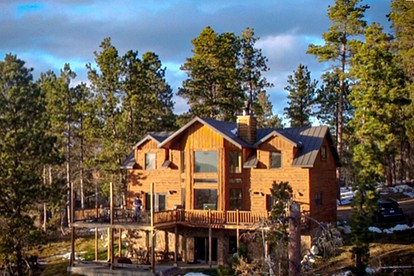 Rustic Secluded Log Cabin with a Hot Tub near Historic Deadwood, South Dakota - glamping.directory