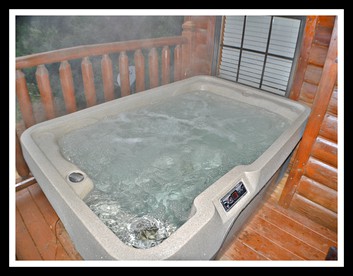 Romantic Cabin Retreat with a Hot Tub near Sevierville, Tennessee - Sevierville, Tennessee - glamping.directory