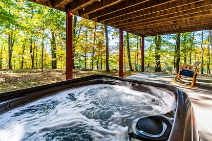 Spacious Chalet-Cabin with Hot Tub, Huge Deck, Fire Pit All Just a 15 Minute Walk to Sleepy Creek in Berkeley Springs, WV - Berkeley Springs , West Virginia - glamping.directory