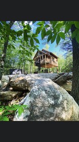 Luxurious Tree House with Hot Tub and Firepit, Perched over Littlefield Pond, Perfect for a Relaxing Weekend Getaway near Portland, Maine - Sanford, Maine - glamping.directory
