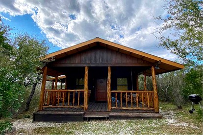 Rustic Studio Cabin in Texas Hill Country near Medina Lake, Perfect for a Weekend of Fishing or Kayaking - glamping.directory