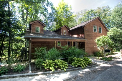 Beautiful Cabin with Hot Tub Surrounded by Trees in Confluence, Pennsylvania - glamping.directory
