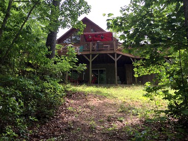 Secluded Log Cabin Apartment Nestled in Trees near Lake Lure, North Carolina - Lake Lure, North Carolina - glamping.directory