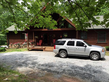 Secluded Log Cabin Apartment Nestled in Trees near Lake Lure, North Carolina - glamping.directory