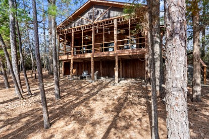 Tranquil Peaceful Cabin with Stunning Lake Views in La Grange, Texas - glamping.directory