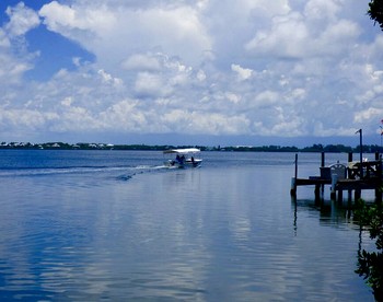 Charming Island Retreat with Gulf Views & Private Dock Access near Little Gasparilla, Florida - Placida, Florida - glamping.directory