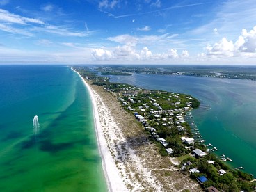 Charming Island Retreat with Gulf Views & Private Dock Access near Little Gasparilla, Florida - Placida, Florida - glamping.directory